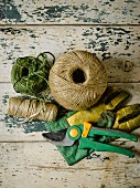 Various reels of string, secateurs & gardening gloves
