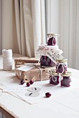 Wrapped gifts and jam jars with hand-written labels