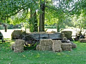 Hay wagon and bales of straw