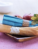 Cotton napkins with hand-made, delicate wooden napkin rings