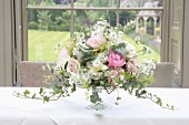 Romantic bouquet on wedding table
