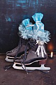 A pair of ice skates filled with presents