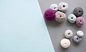 Balls of wool in various colours and textures (seen above)