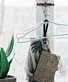Wire clothes hangers with knitted covers