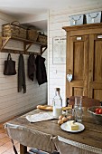 Breakfast ingredients on table in rustic interior with French atmosphere
