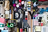Symbolic DIY image with large selection of craft utensils and accessories