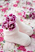 Pink baby socks with carnations