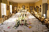 Table festively set for birthday dinner in dining room of private Georgian house in Suffolk, England.