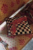Checked cushion with lobster motif