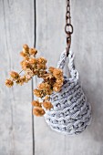 Dried hop flowers in hanging basket made from crocheted Zpagetti-yarn cover
