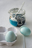 Dying Easter eggs pale blue