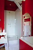 Vintage-style bathroom with red walls