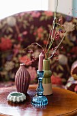 Colourful vases and profiled candlestick
