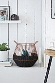 Hand-crafted wire basket wrapped in dark brown sisal cord