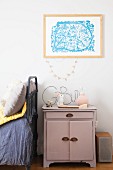 Lilac cabinet used as bedside table in child's bedroom