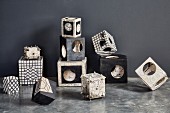 Still-life arrangement of various cubic, Japanese Raku ceramics