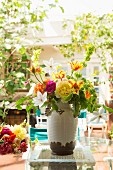 Summery bouquet on terrace table