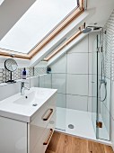 Small bathroom with sloping ceiling