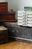Old trunks, sets of drawers and boxes made of metal and wood
