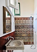 Traditional wall tiles in restored bathroom with Mediterranean ambiance