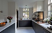 Modern country-house kitchen without wall units