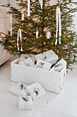 White chip wood basket of gifts under Christmas tree