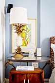 Table lamp with pineapple-shaped base on bedside tabe