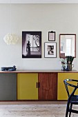 Pictures above retro sideboard with door in various colours