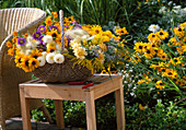 Basket of freshly cut summer flowers for a bouquet