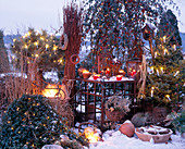 Winter terrace with evening mood by candles