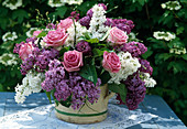 Bouquet with Syringa vulgaris (lilac), rose petals