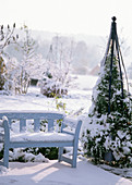 Garden bench with snow