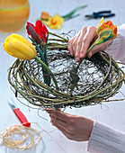 Spring bouquet in wicker wreath