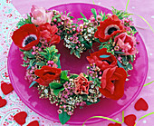 Heart with anemones, waxflower and snowball blossoms