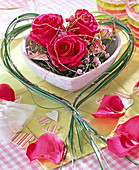 Rose arrangement in heart shell