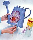 Napkin decoration, viola on metal watering can