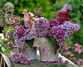 Syringa vulgaris bouquet in twin pot with viola motive