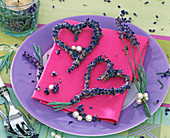 Lavandula hearts and bouquet on pink napkin
