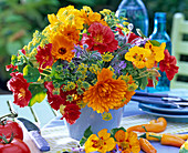 Colorful summer bouquet with herbs and edible flowers