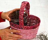 Bouquet in pink bast basket