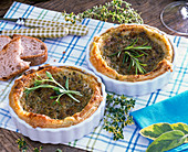 Small herb quiches decorated with rosemary (rosemary)