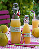 Pyrus juice in ironing bottles with labels 'Birnensaft'