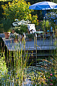 Wooden deck in the swimming pond