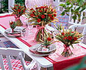 Table decoration with wheat and zinnias
