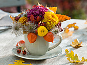 Small autumn arrangement in cup