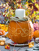 Carved pumpkin as a candle holder