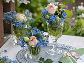 Small bouquets of Rose 'Eden Rose' and Myosotis