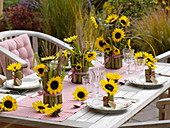 Table decoration with sunflowers and sacaline
