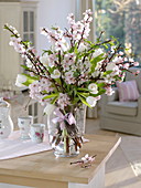Pastel spring bouquet in glass vase