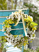 White-yellow spring wreath on backrest